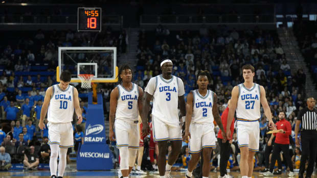 Brandon Williams (5) Adem Bona (3) Dylan Andrews (2) Jan Vide ucla men's basketball